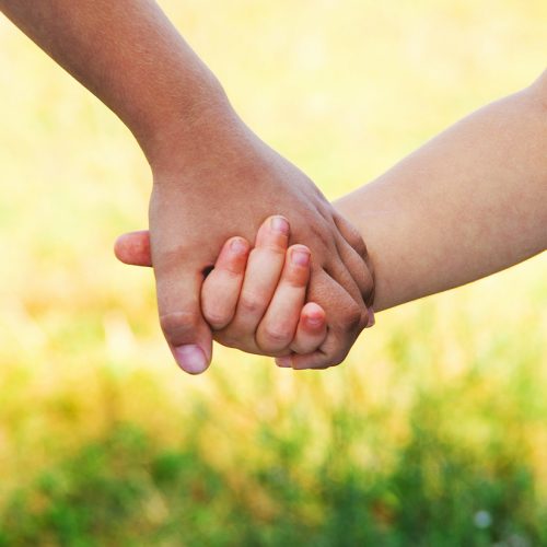 kids join hands